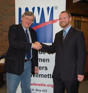 Donald Zeigler, a representative from Mothers Against Drunk Driving, and Alex Koroknay-Palicz, of the National Youth Rights Association, shake hands at the debate