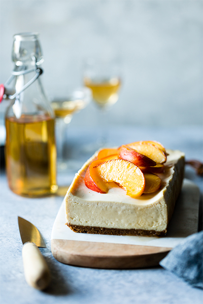 8 Fresh Recipes Using Seasonal Produce: Small Batch Cheesecake With Elderflower Peaches from The Bojon Gourmet
