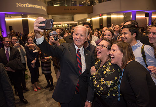 Joe Biden takes a selfie with the audience after a recent speech at Northwestern University