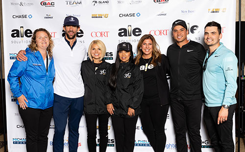 Marisa Fortier, Michael Phelps Foundation; Michael Phelps; Christa Landgraf, ALE; Rowena Zimmers, ALE; Tracey Bricker, ALE; Jason Day and Clark Harvey, Brighter Days Foundation