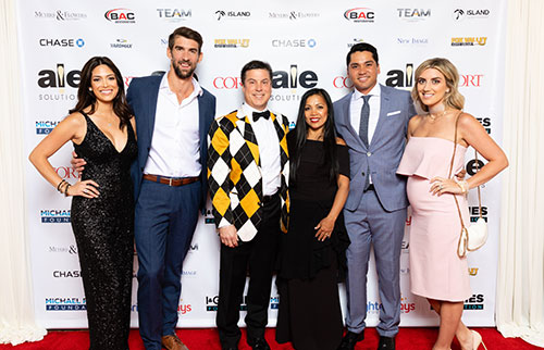 Nicole Phelps, Michael Phelps, Robert Zimmers, Rowena Zimmers, Jason Day, and Ellie Day