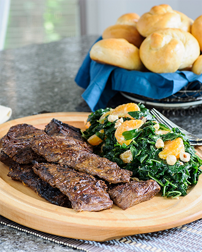 Recipes: Chipotle Honey Marinated Skirt Steak and Kale, Clementine, and Hazelnut Salad from Carrie Schloss, the author of “The Asheville Bee Charmer Cookbook.”