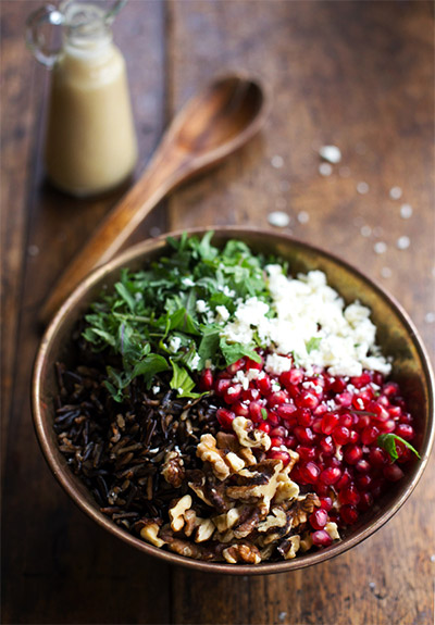 Vegetable Side Dishes for Thanksgiving: Pomegranate, Kale, and Wild Rice Salad with Walnuts and Feta from Pinch of Yum