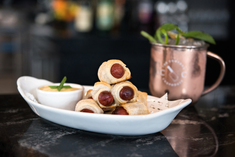 Hot Dog Recipes: Mini Kobe Dogs in a Blanket with Champagne Mustard Sauce from Cowford Chophouse