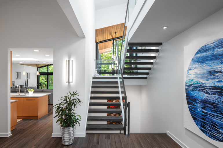 The staircase in a green home designed by Kipnis Architecture and Planning