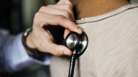 Doctor treating patient