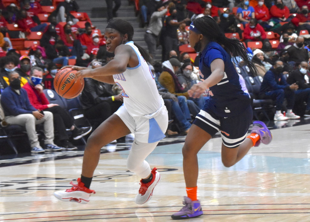 Kenwood Academy's Brianna McDaniel dribbles with Whitney Young's Destiny Jackson defending during the 2022 Chicago Public League city championship game at Credit Union 1 Arena | Photo by: Kaleb Carter