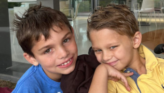Cooper Roberts (right) with his twin brother, Luke, at Shirley Ryan AbilityLab | Photo courtesy of The Record North Shore