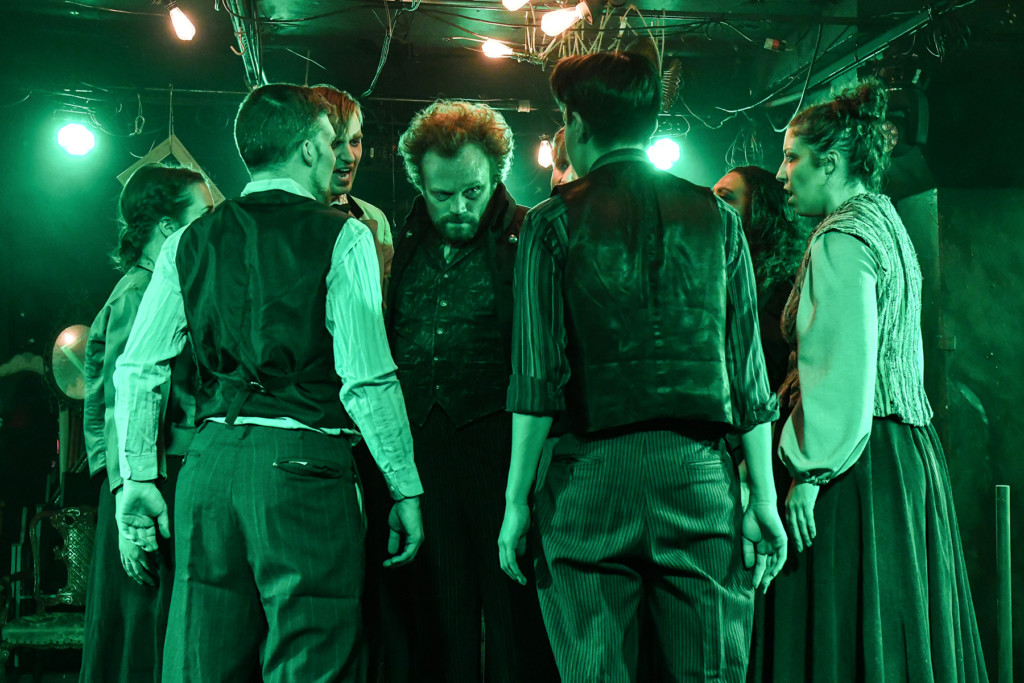 (center) Kevin Webb and the cast of Kokandy Productions’ revival of Sweeney Todd: The Demon Barber of Fleet Street | Photo by Evan Hanover.