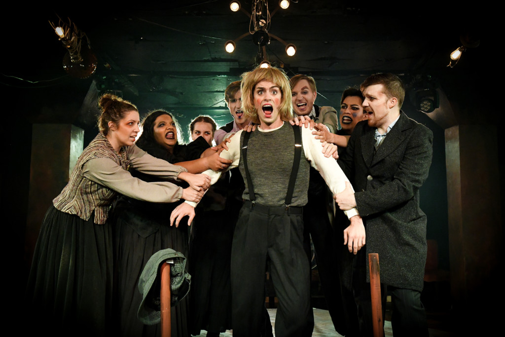 (center) Patrick O'Keefe and the cast of Kokandy Productions’ revival of Sweeney Todd: The Demon Barber of Fleet Street | Photo by Evan Hanover.