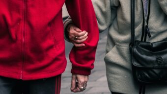 holding hands Photo by Jack Finnigan on Unsplash
