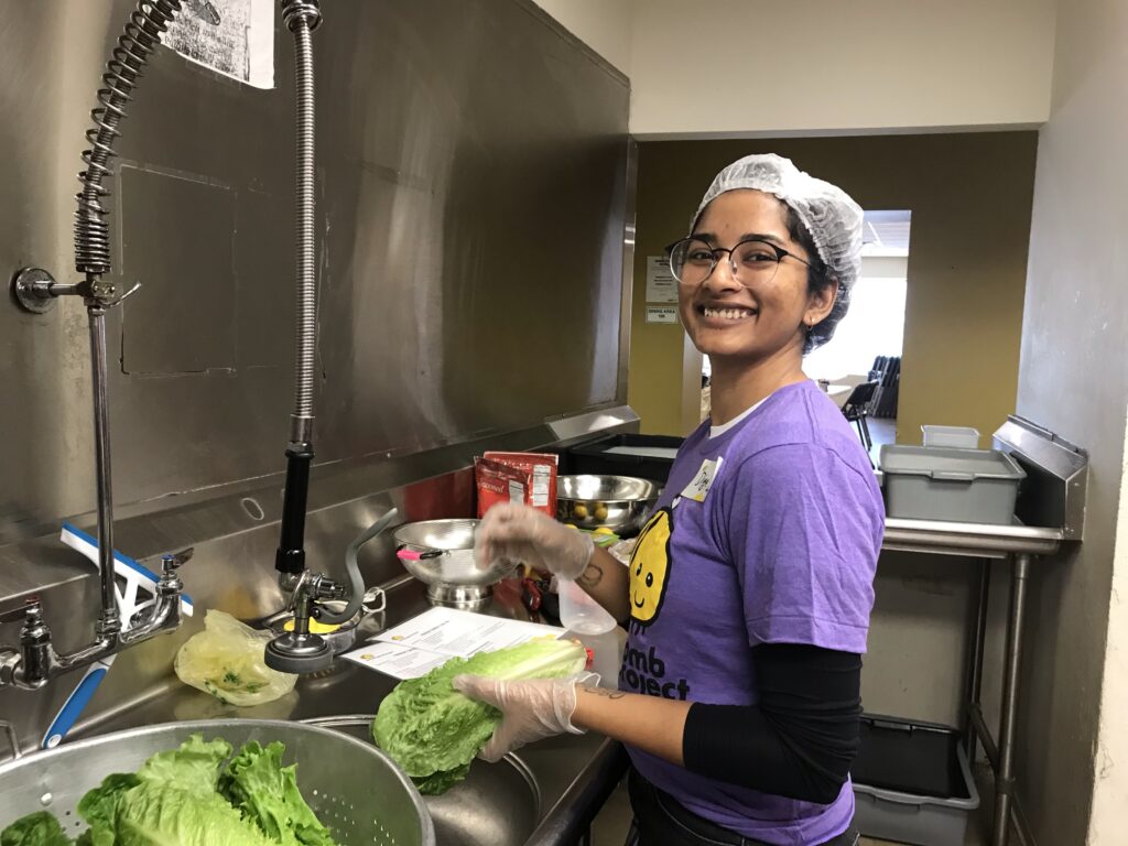 Teen volunteers making meals 