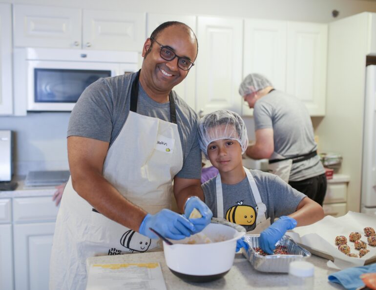 The Honeycomb Project volunteers make cookies