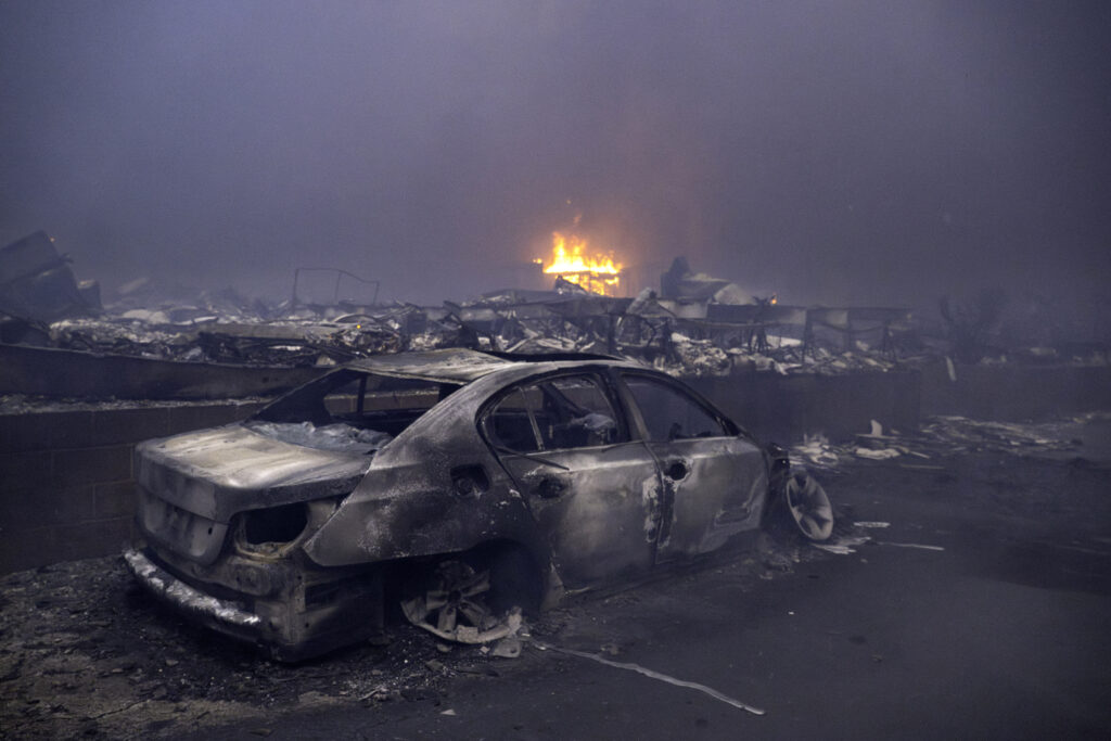 January 8, 2025:  Cars and homes distroyed by the Palisades Fire, in Malibu Village. 