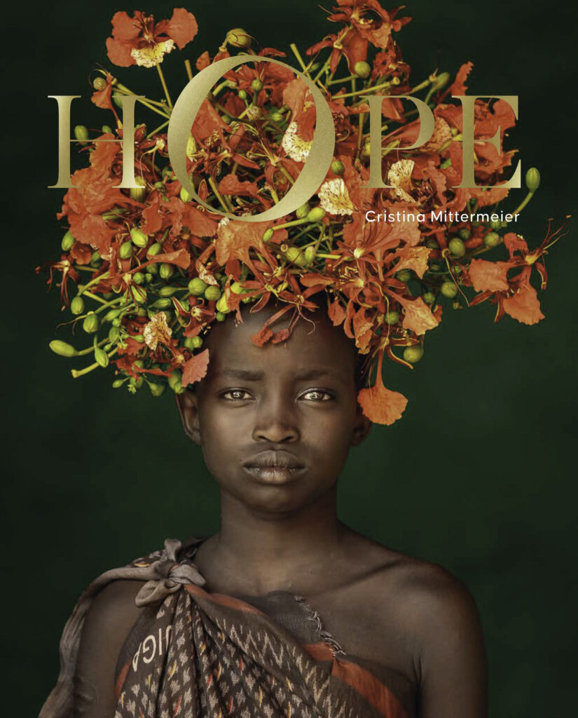 HOPE book cover of Suri girl, Omo Valley, Ethiopia. @Cristina Mittermeier