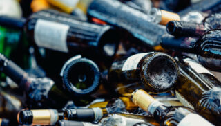 A large heap of empty wine bottles. Garbage. Recycle concept. Ecology