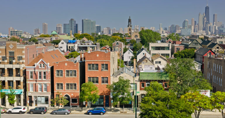Aerial View Over Houses in Wicker Park Revealing Chicago Loop Skyline