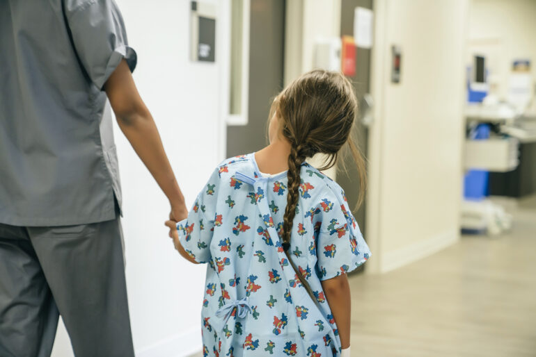 kid in hospital with nurse