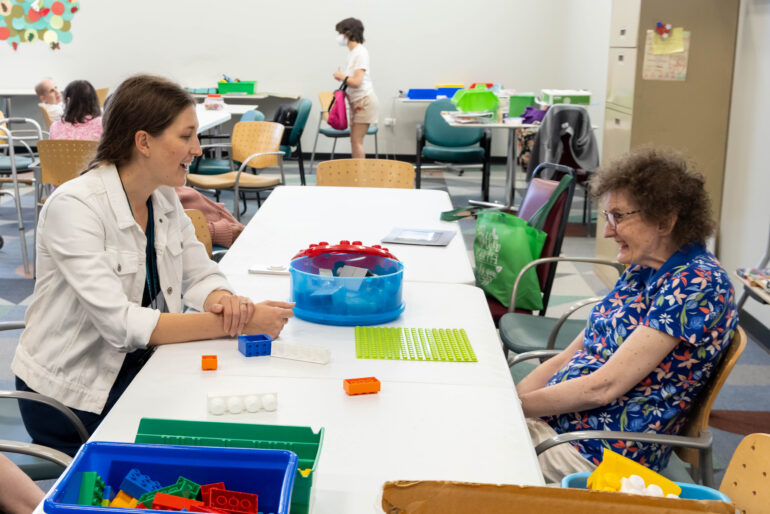 Avenues' Director of Clinical Services Erin Kalaway talks with client. Photo courtesy of Avenues to Independence.