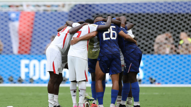 MIAMI GARDENS, FLORIDA - JULY 18: England and France players huddle after the FIFA World Cup 2026 Bronze Final between France and England at Miami Stadium on July 18, 2026 in Miami Gardens, Florida. (Photo by Buda Mendes/Getty Images)